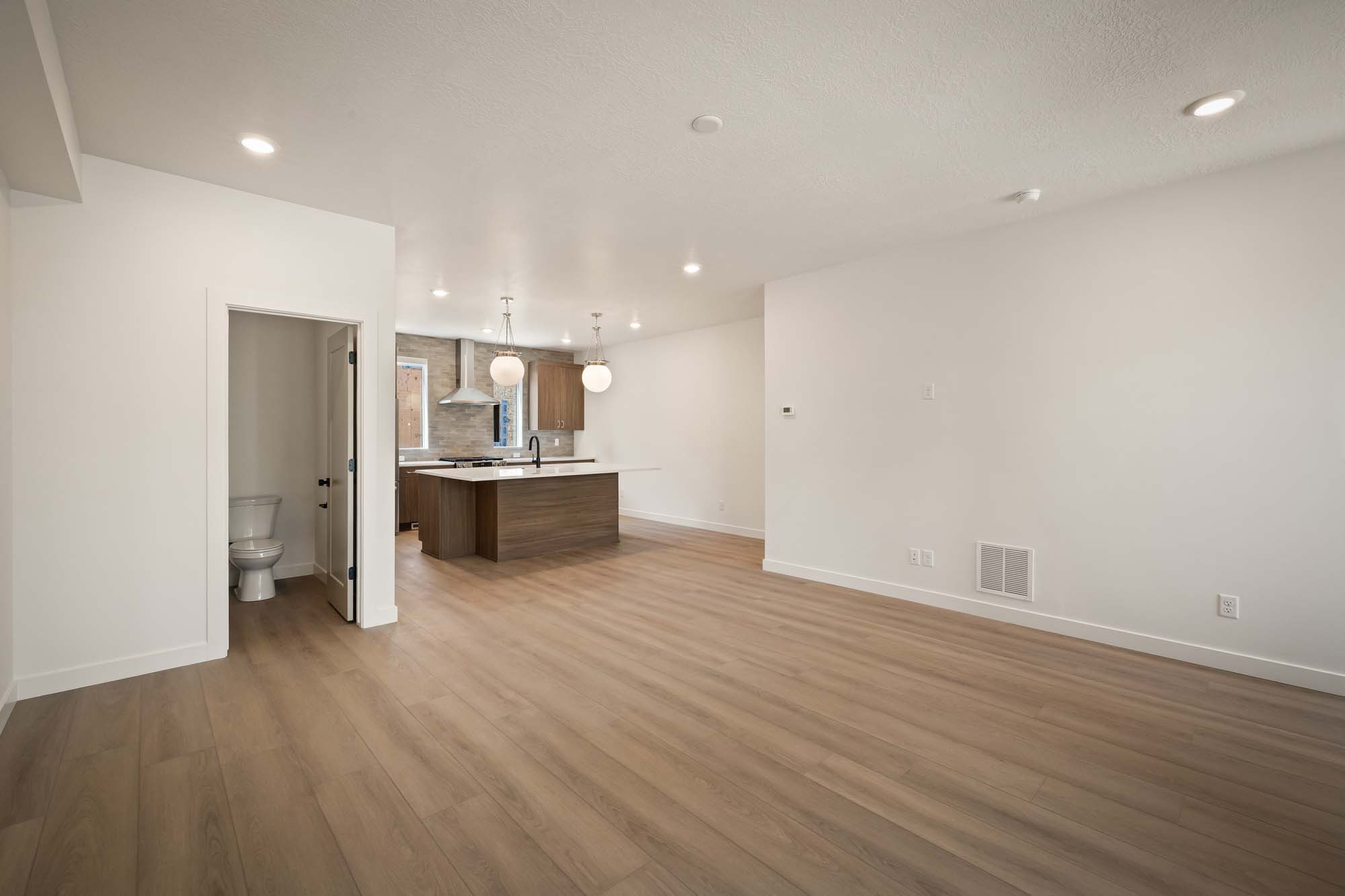 Living Room to Kitchen | Cambria B at theIVY in Millcreek, UT by Cole West