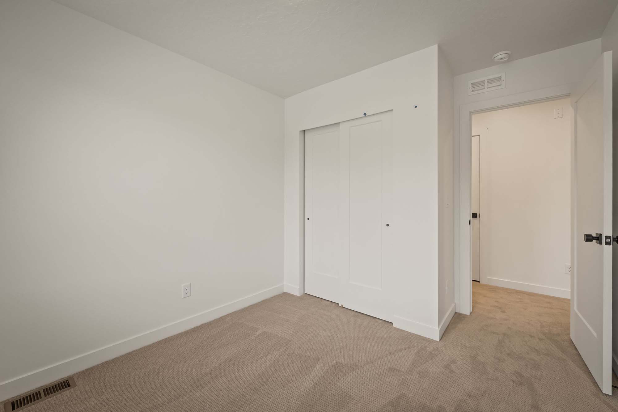 Bedroom 2 | Cambria E Interior Units at theHAZEL in Roy, UT by Cole West