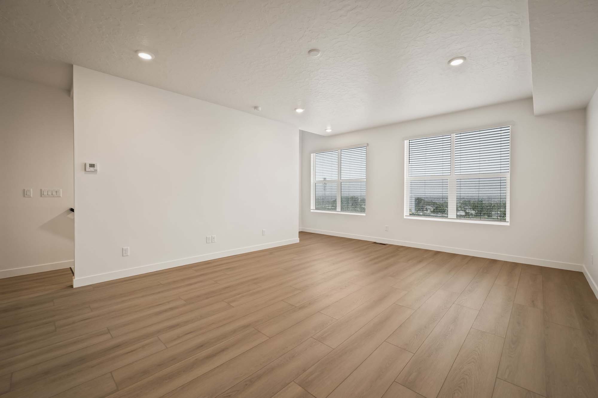 Great Room | Cambria E Interior Units at theHAZEL in Roy, UT by Cole West