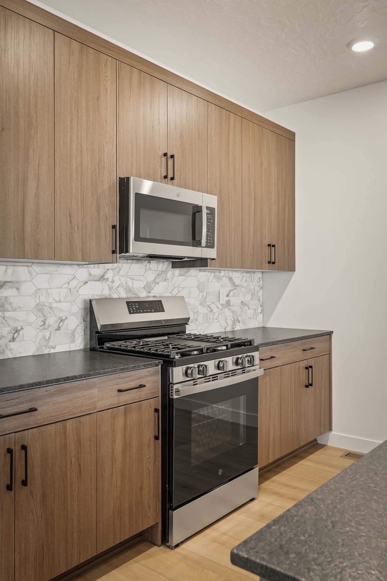 Kitchen | Cambria E Interior Units at theHAZEL in Roy, UT by Cole West