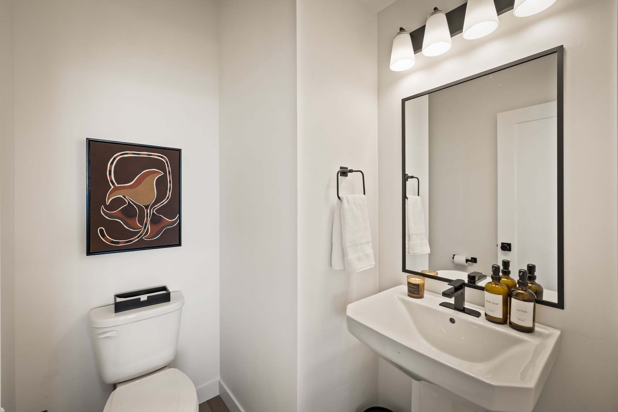 Powder Room | Cambria E Exterior Units at theHAZEL in Roy, UT by Cole West