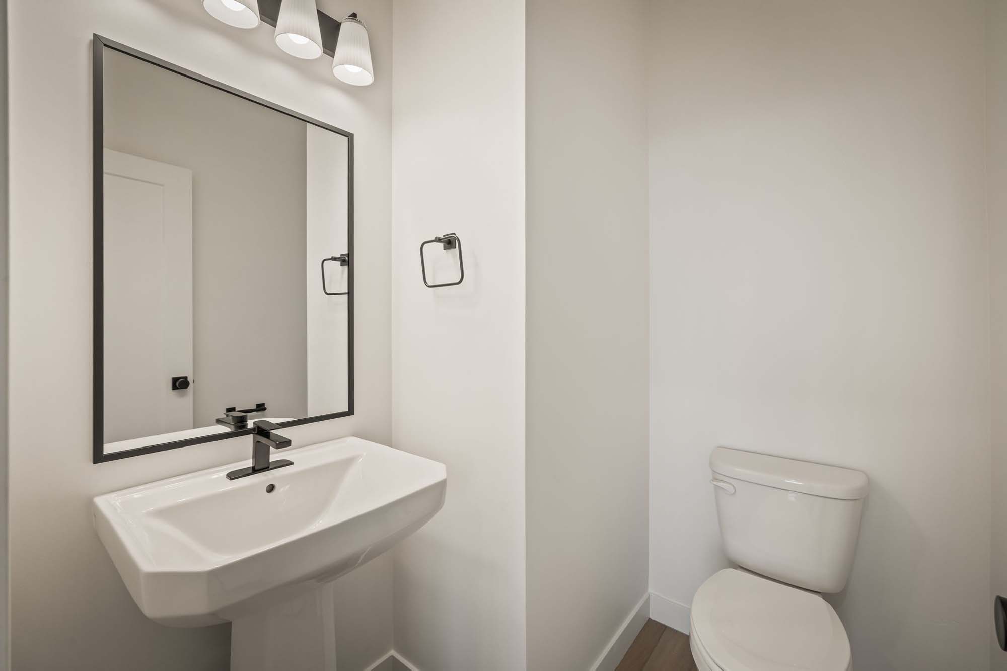 Powder Room | Cambria E Interior Units at theHAZEL in Roy, UT by Cole West