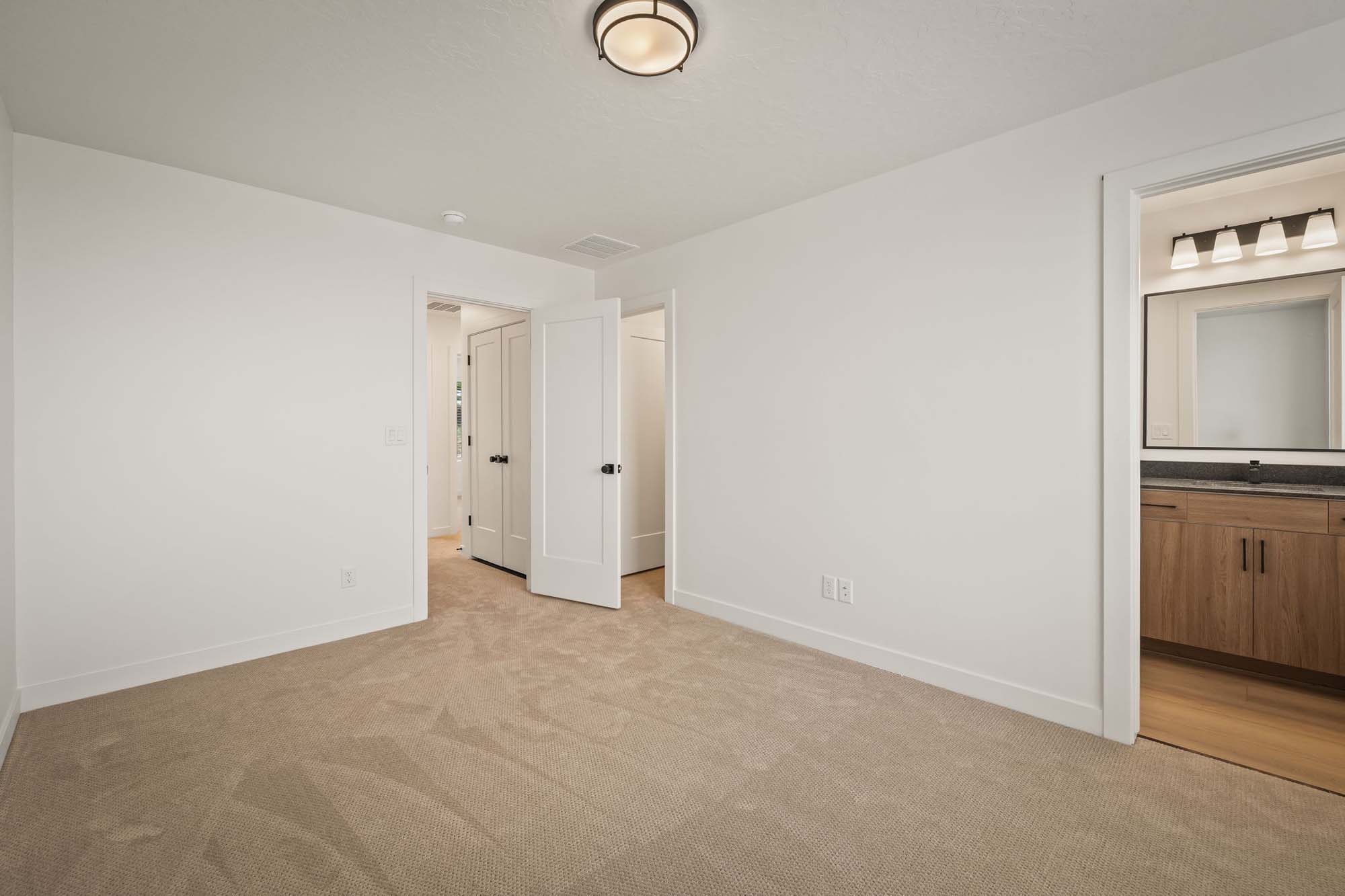 Primary Bedroom | Cambria E Interior Units at theHAZEL in Roy, UT by Cole West