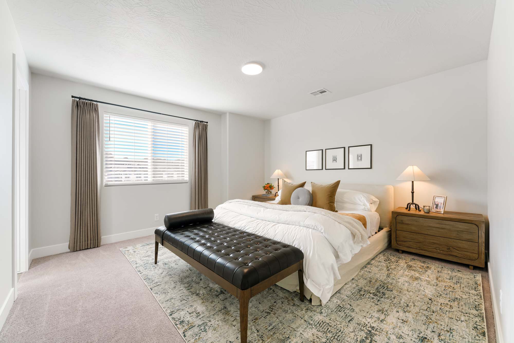 Primary Bedroom | Sunrise at RISE in Washington, UT by Cole West
